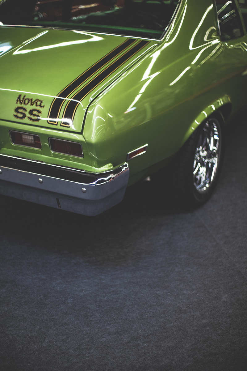 chevrolet, road, car, street, reflection, outdoors, green, luxury, transportation, stationary, mode of transportation, nova, no people, wheel, parking