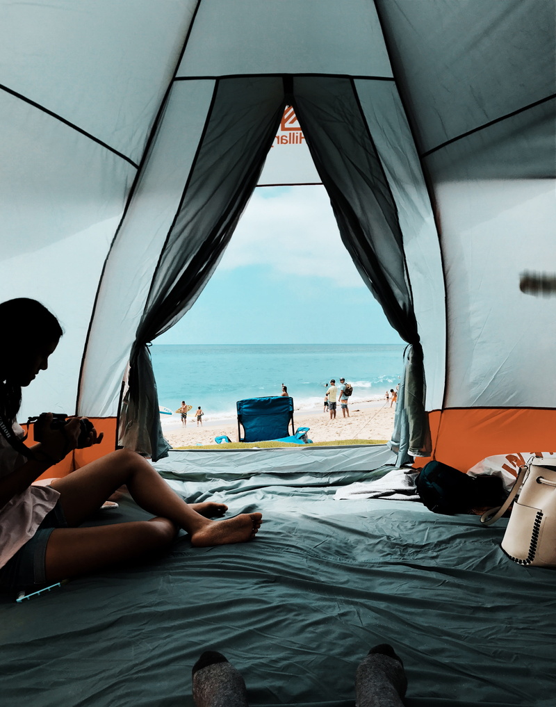 outdoors, sky, leisure activity, person, clouds, adult, ocean, men, transportation, mode of transportation, doorway, vacations, sand, female, horizon over water