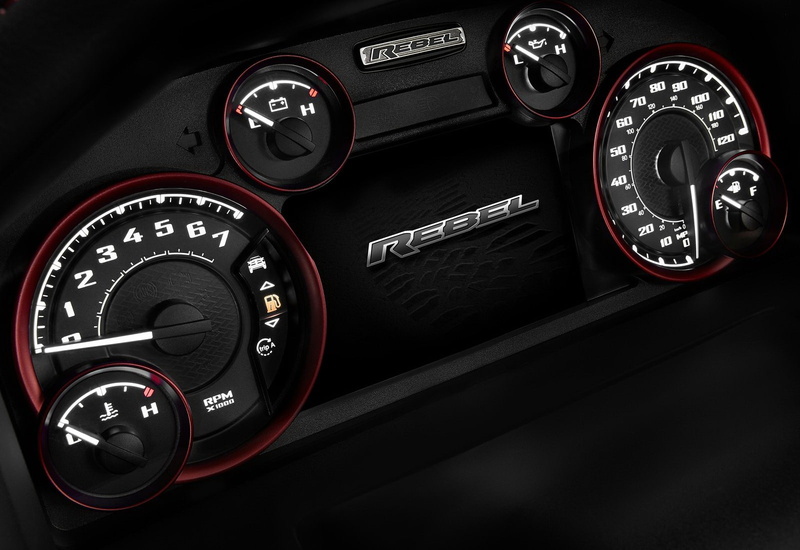 no people, motor vehicle, black color, speed, indoors, ram, dashboard, 1500, red, rebel, car interior, car, transportation, number, luxury, close-up, mode of transportation