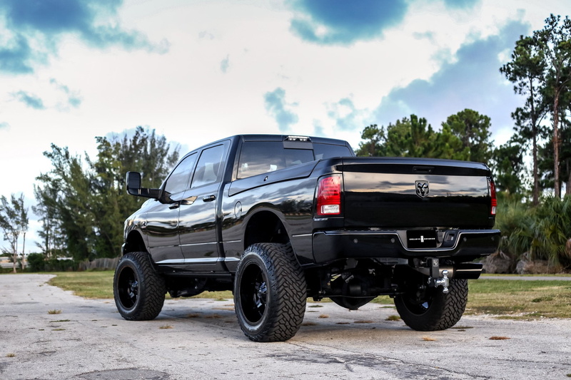 city, wheel, road, mode of transportation, day, cloud - sky, ram, transportation, lifted, outdoors, stationary, car, nature, 4x4, plant, 2018, black, land vehicle
