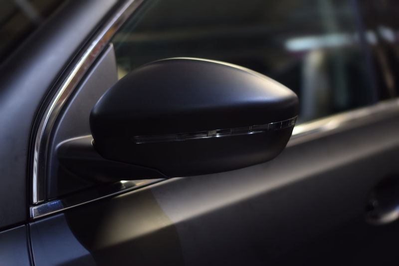 food and drink, metal, mode of transportation, black color, shiny, lifestyle, silver colored, sticker, mirror, mat, side, reflection, photography, auto