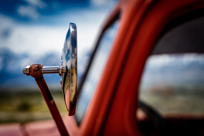selective, trademark, eastern sierras, close-up, alloy, red, no people, vintage car, nature, land vehicle, wheel, mirror, cloud - sky, selective focus
