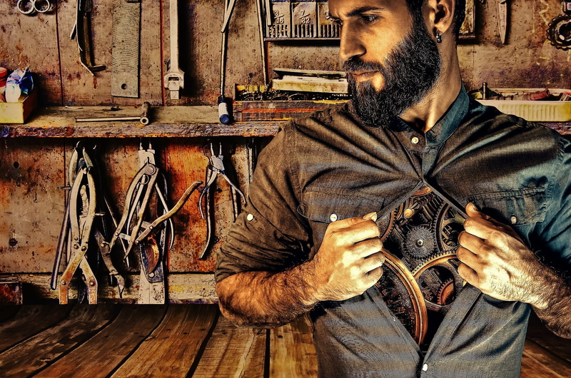 one man only, opening, casual clothing, wood - material, indoors, work, gears, only men, mid adult men, body, real people, lifestyles, front view, leisure activity
