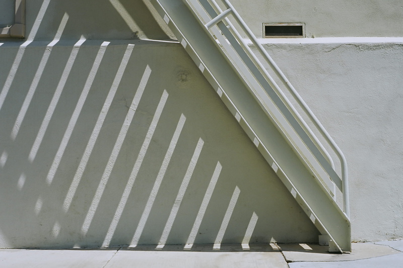 building exterior, stairwell, railing, no people, 2K, white color, built structure, concrete, transportation, day, city, steps and staircases, metal, wall - building feature