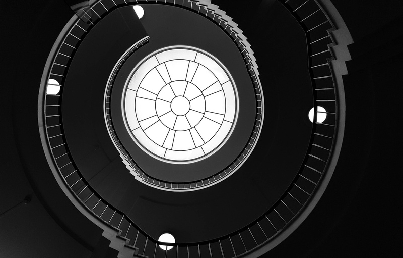 shape, stair, geometric shape, dome, ceiling, stairwell, staircase, railing, low angle view, indoors, photo, steps and staircases, no people, architectural feature