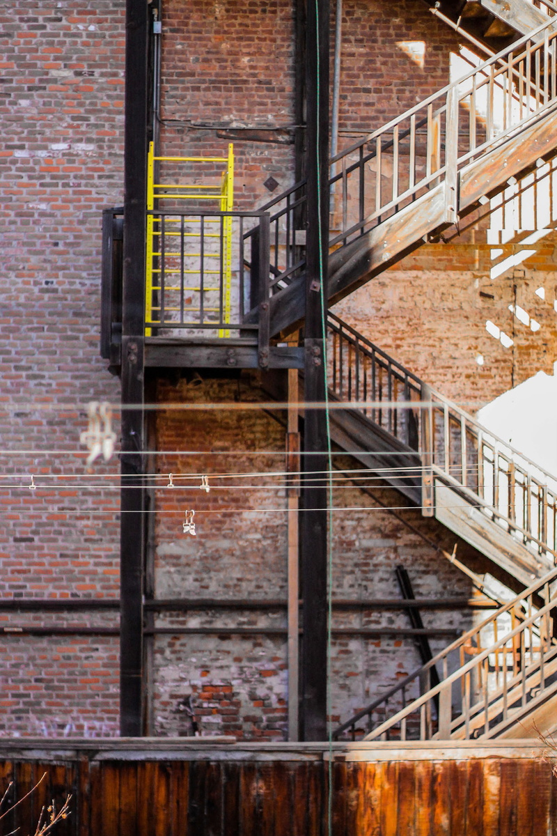 brick wall, outdoors, city, brick, metal, ladder, old sacramento, wall, yellow, railing, lines, sacramento, fire escape, staircase, stairs, architecture
