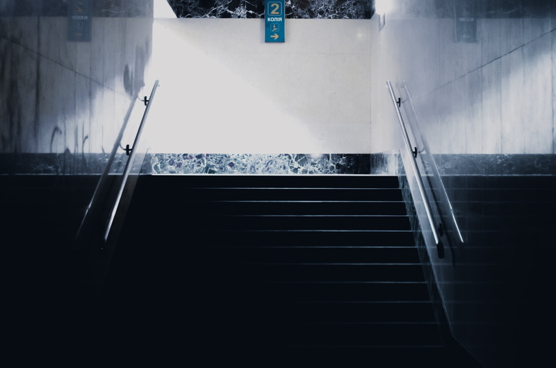direction, railing, no people, hallway, absence, steps, cold temperature, architecture, ice rink, steps and staircases, high angle view, transportation