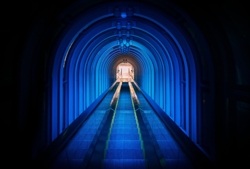 lighting equipment, architecture, transportation, vanishing point, dark, light at the end of the tunnel, staircase, blue, illuminated, built structure