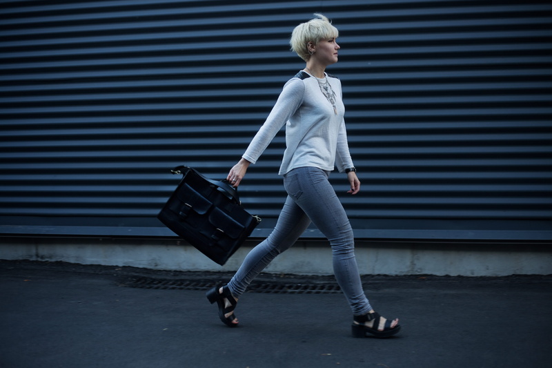 handbag, adult, black, motion, pavement, wear, day, side view, casual clothing, architecture, outdoors, profile view, women, bag, real people, young adult