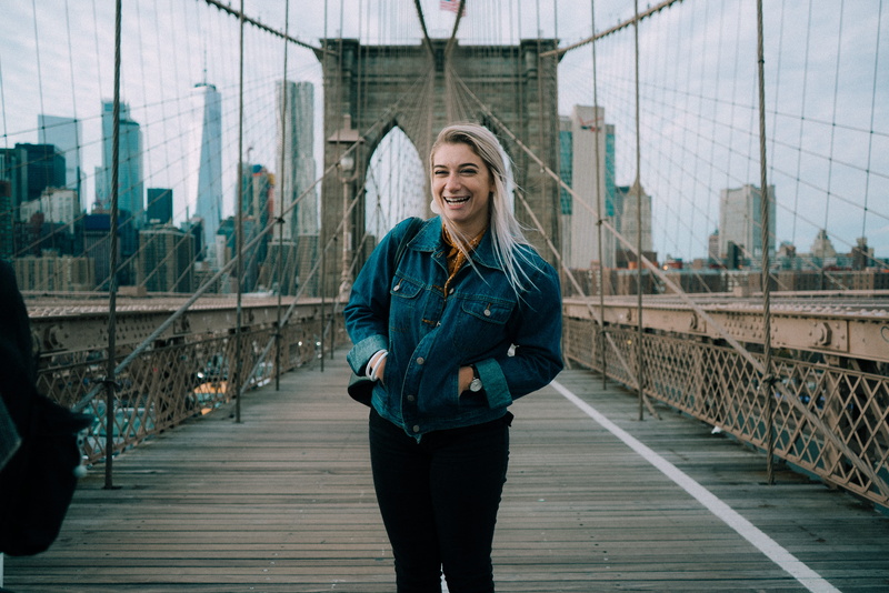 4K, lifestyles, front view, hairstyle, blue, city, bridge - man made structure, woman, footbridge, blonde hair, casual clothing, young adult, women, denim