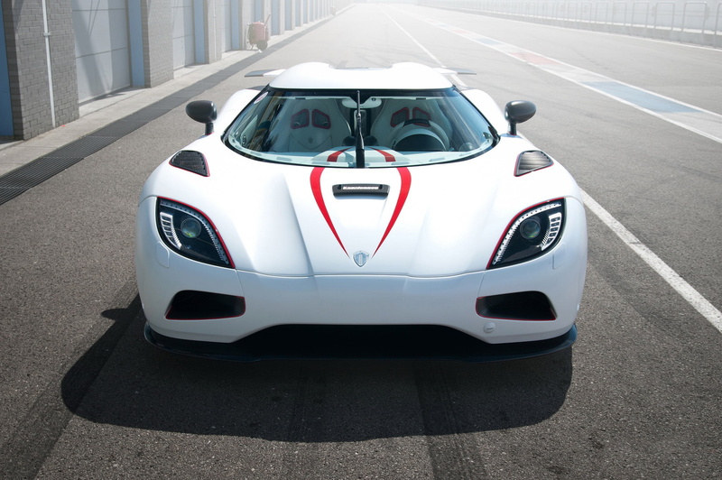 car, built structure, hypercar, sports race, street, day, koenigsegg, no people, road, high angle view, agera r, city, mode of transportation, symbol, motor vehicle