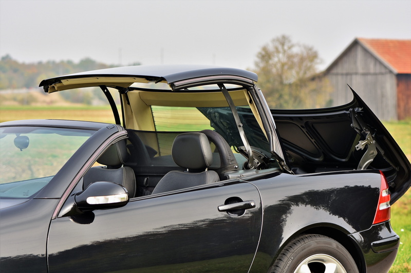 mercedes, vehicle, nature, architecture, mode of transportation, design, black, day, sporty, field, passengers cars, outdoors, land vehicle, sky, building exterior