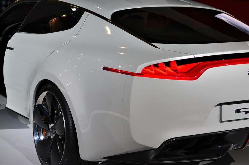 silver colored, motor vehicle, polished, tire, auto, mode of transportation, technology, land vehicle, close-up, motor, exhaust, tail light, shiny, turbo