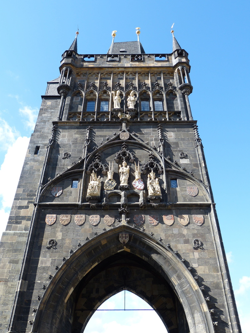 tower, old town, arch, building exterior, travel destinations, gothic Style, low angle view, kar bridge, built structure, day, no people, church, city