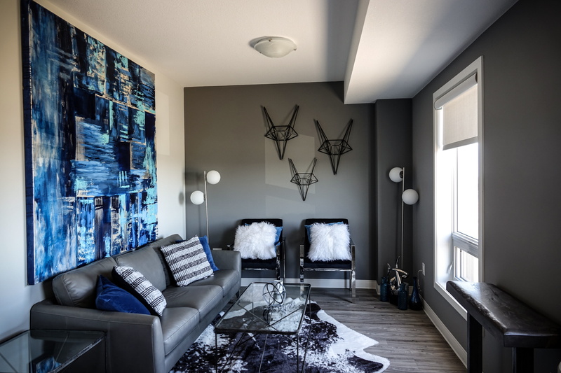 lifestyles, no people, couch, decor, side table, day, flooring, architecture, behind, pillow, abstract wall hangings, domestic life, fuzzy pillow, luxury style