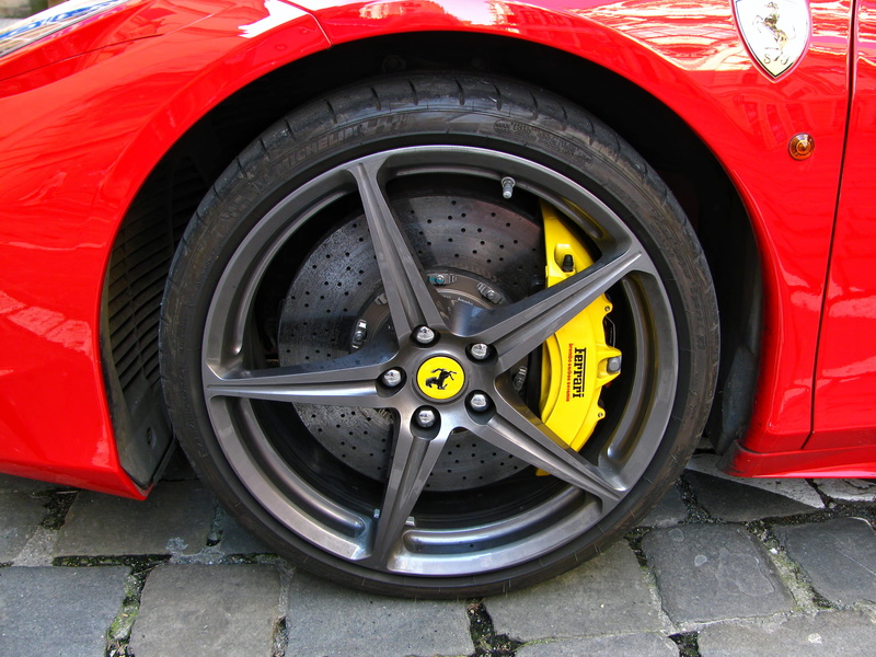 shiny, motor vehicle, modern, tire, no people, transportation, red, racing car, motors, vehicles, design, street, power, rubber, at the edge of, chrome