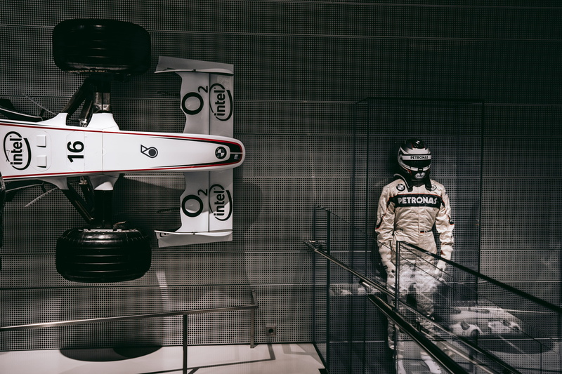 day, speed, auto, showroom, design, one person, indoors, BMW, transportation system, driver, f, standing, race, architecture, digital composite, statue