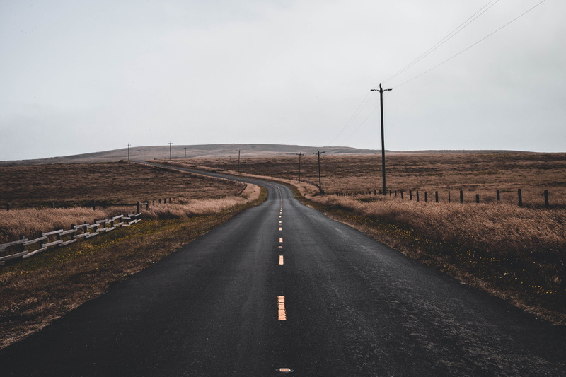 highland, environment, no people, telephone pole, landscape, fence, utility, telephone line, lonely road, marking, country, nature, discover, sky, sign