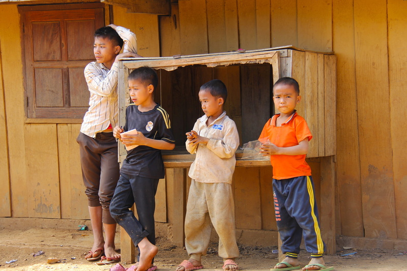 offspring, happiness, culture, outdoors, laos, happy, females, mature men, asian, family, young, orange, front view, boys, son, women, parent, full length