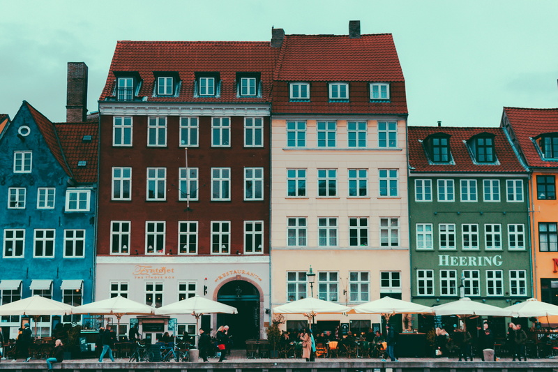 women, real people, neighborhood, window, hotel, cafe, condo, row house, city, urban, city life, incidental people, nyhavn, built structure, denmark, copenhagen