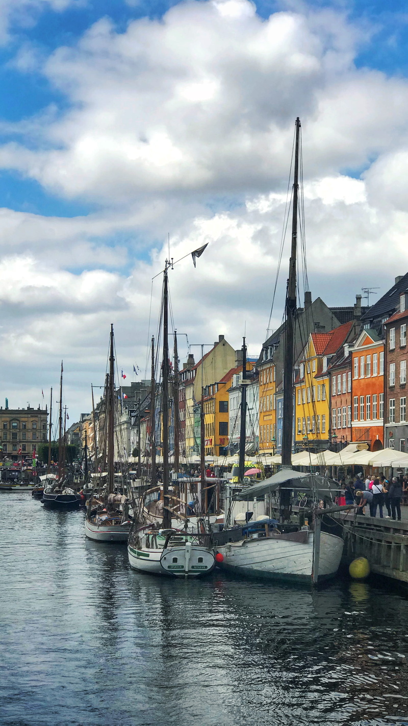 vehicle, waterfront, river, human, architecture, boat, person, water, sailboat, urban, denmark, nyhavn 47, cloud - sky, no people, copenhagen, dock, pole