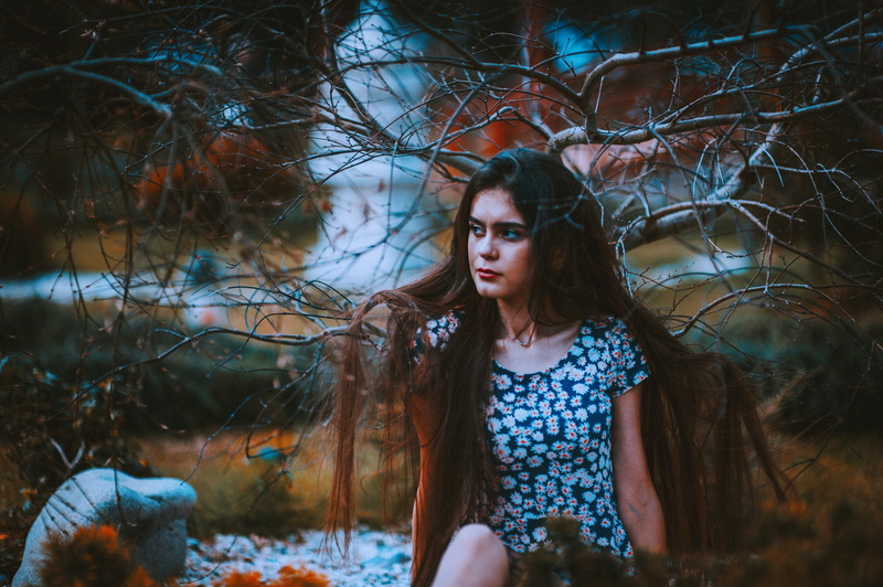one person, black, forest, casual clothing, white, look, real people, sit, outdoors, floral, person, female, plant, land, fashion, lifestyles, looking