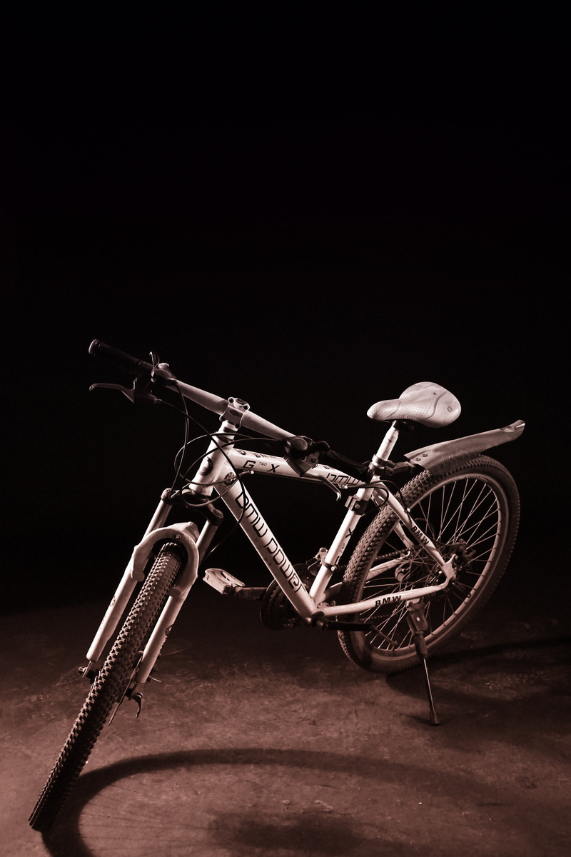 metal, studio shot, bicycle, mode of transportation, black background, cycle, gun, old, protection, cycling, photography, communication, realism, bike