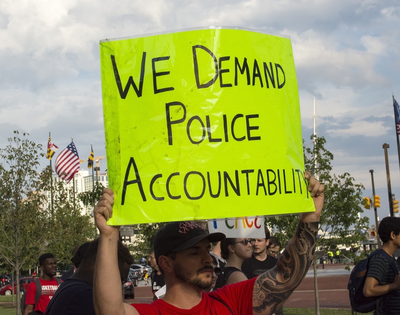 western script, sky, person, government, black lives matter, blm, crowd, real people, green, banner, sign, street, adult, outdoors, emotion, communication