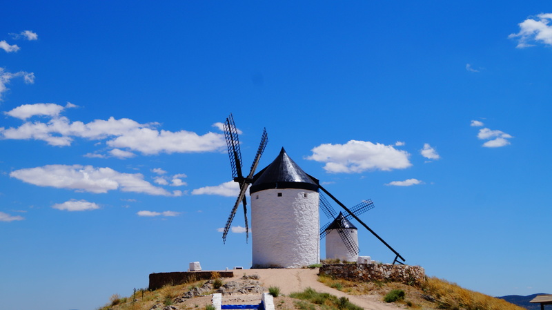 environment, alternative energy, day, famous, hill, building exterior, landscape, built structure, turbine, tourism, spain, the past, no people, sky, traditional windmill