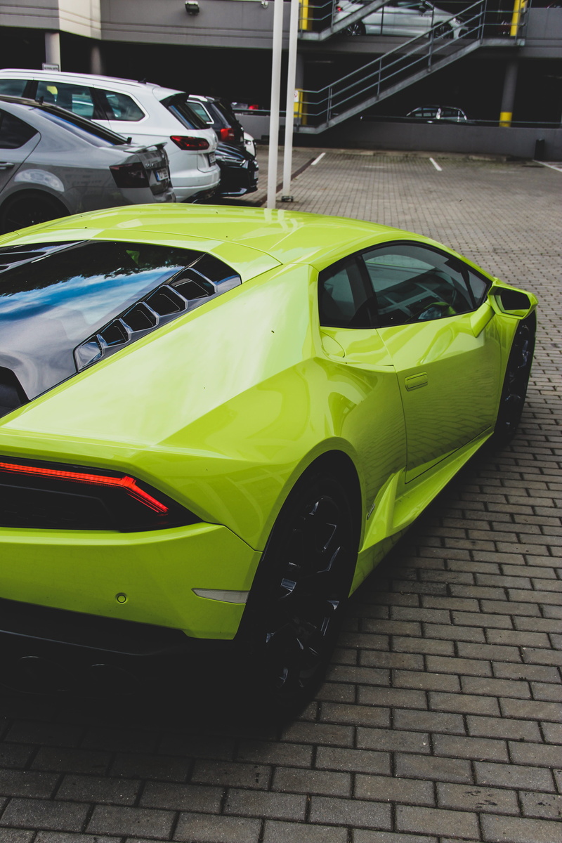 in a row, motor racing track, lamborghini huracán, 5K, high angle view, road, city, outdoors, transportation, yellow, garage, speed, motor vehicle, car