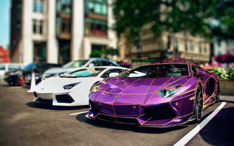 outdoors, elegance, car, travel, two, supercar, modern, europe, parking lot, city, speed, urban Scene, luxury, collectors Car, motor Vehicle, traffic, mode of Transport