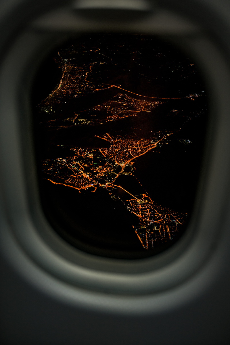 city from above, indoors, close-up, fly, circle, studio shot, single object, black background, design, hole, citylight, shot, plant, still life, city light