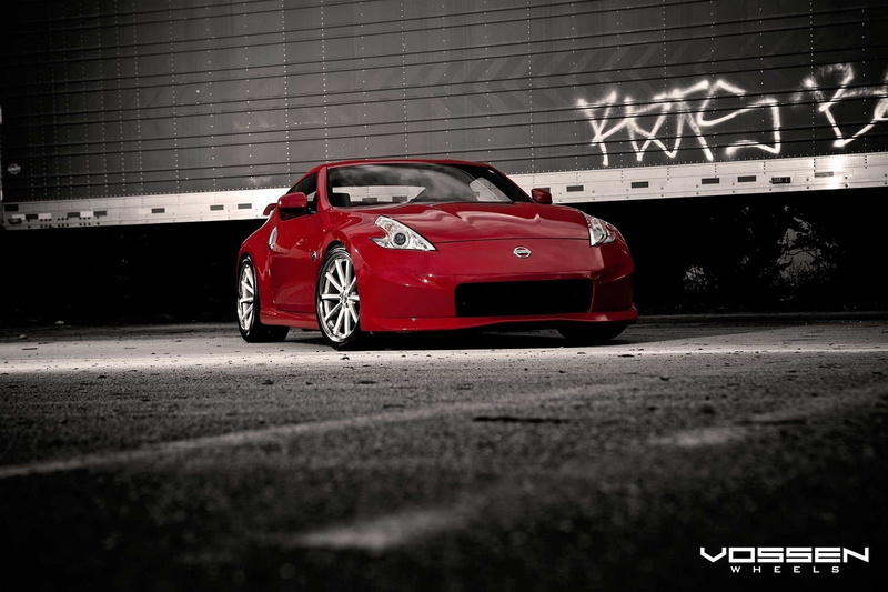 sports car, racecar, sign, red cars, car, day, sport, Nissan, 720P, built structure, speed, number, garage, road, city, mode of transportation, vehicle