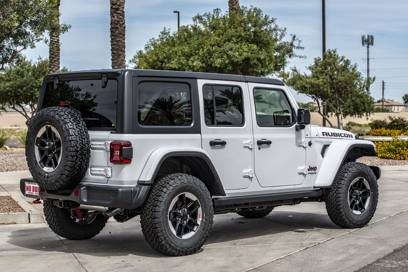vehicle, wheel, mode of transportation, SUV, wrangler rubicon, city, day, outdoors, road, white, off road, street, stationary, parked, plant, off-road vehicle