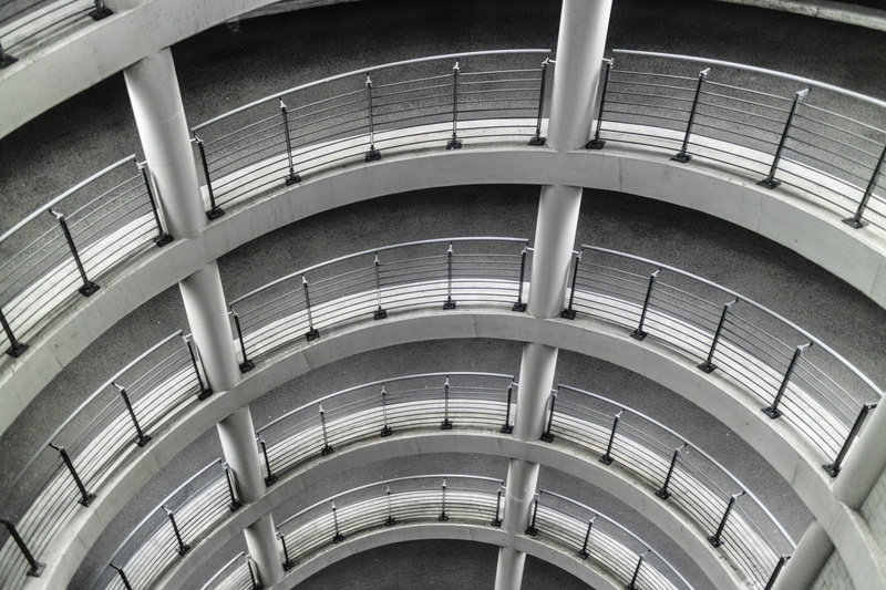 architecture, railing, grey, pattern, spiral staircase, day, indoors, modern, concentric, repetition, architectural feature, multi storey car park, building
