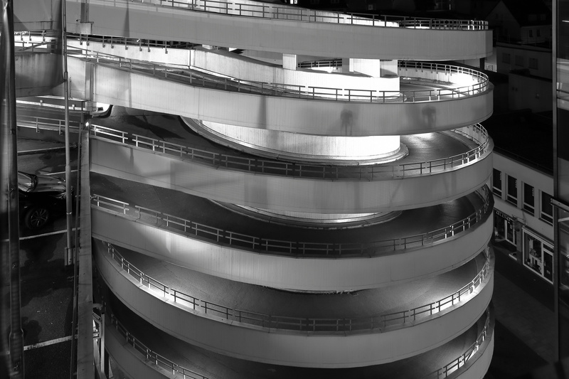 high angle view, at night, braunschweig, spiral, indoors, modern, architecture, multi storey car park, arts culture and entertainment, focus on foreground