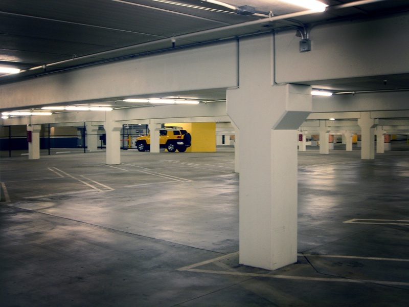 subterranean garage, light, indoors, flooring, parking garage, built structure, dark, ceiling, subway, underground parking lot, architecture, concrete