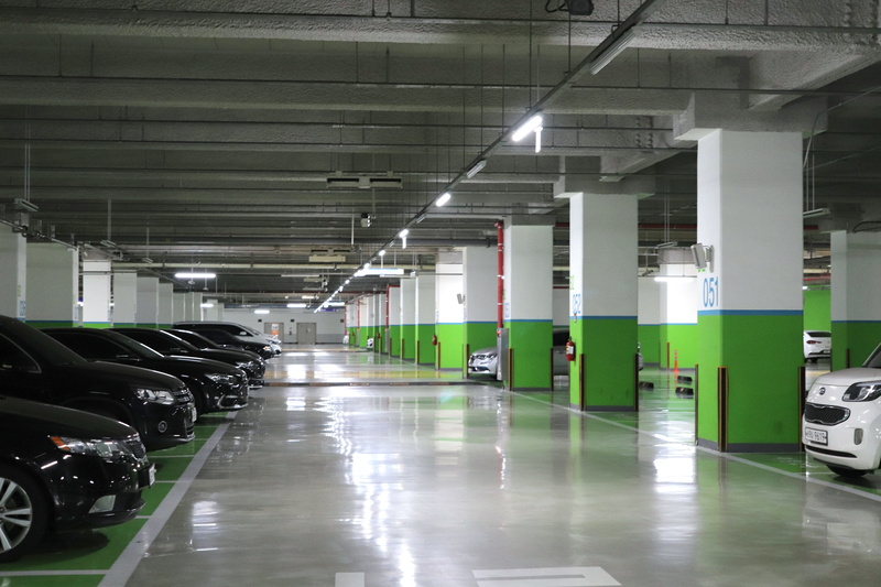 absence, indoors, mode of transportation, building, in a row, parking lot, land vehicle, illuminated, architectural column, car, this special steel company