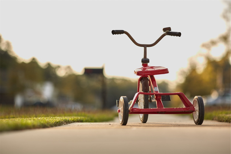 grass, childhood, daytime, showing, mode of transportation, surface level, 1080P, park - man made space, nature, copy space, no people, sunlight, street