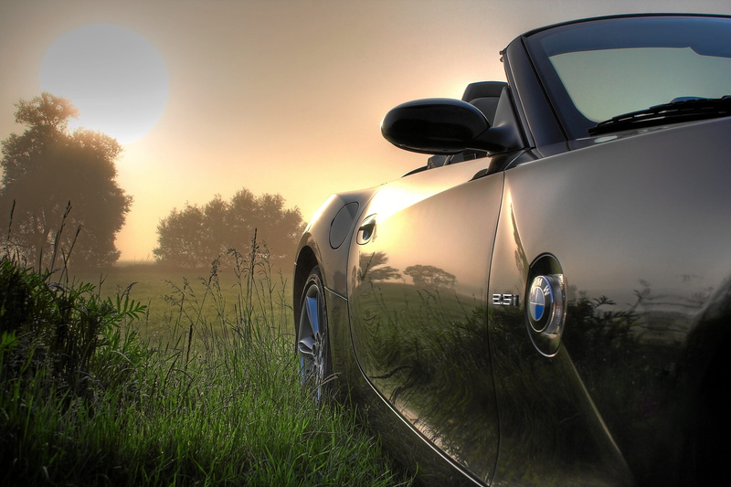 Open, land, land vehicle, nature, grass, sky, road, mode of transportation, E85, silver colored, people, travel, activity, plant, pkw, roadster, sunset