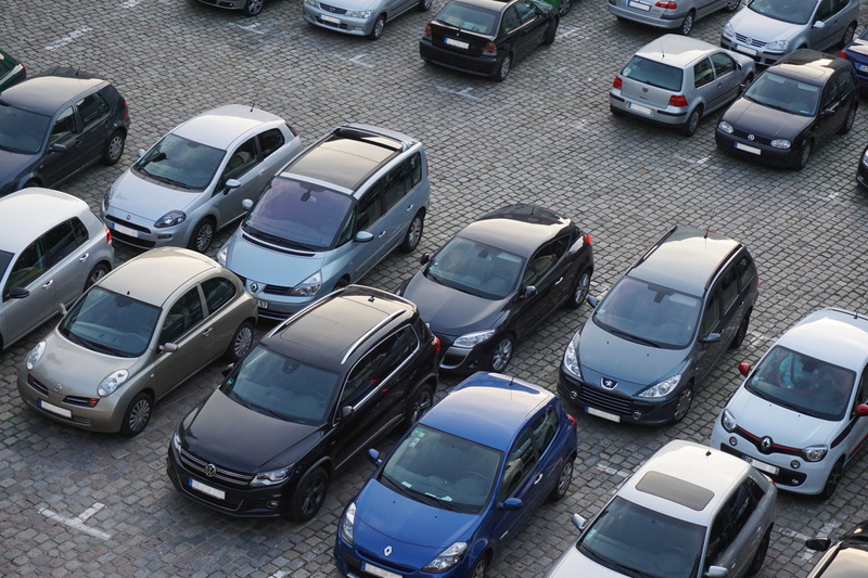 park, road, lot, parking lot, car, daytime, architecture, parking, order, autos, vehicles, communication, city, mode of transportation, color, high angle view