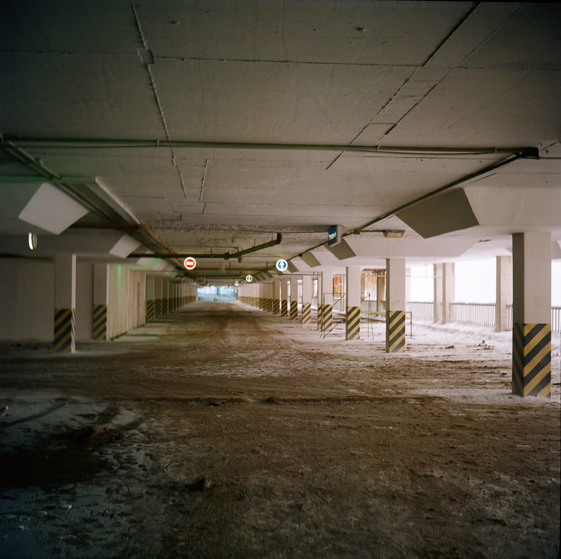 parking, garage, vacant, traffic, window, abandoned, line, house, architecture, passage, lighting equipment, area, absence, park, wall, urban, vehicle