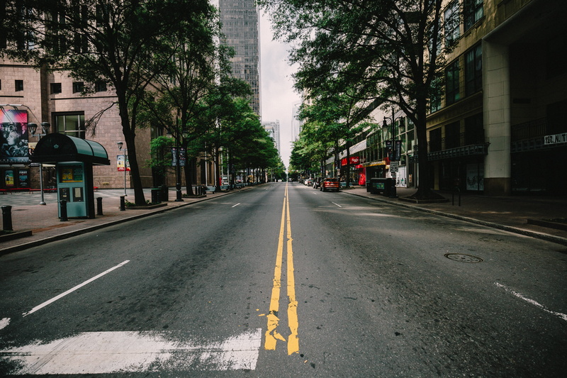 building exterior, outdoors, symbol, vanishing point, building, empty street, urban, nc, diminishing perspective, sign, day, dividing line, built structure