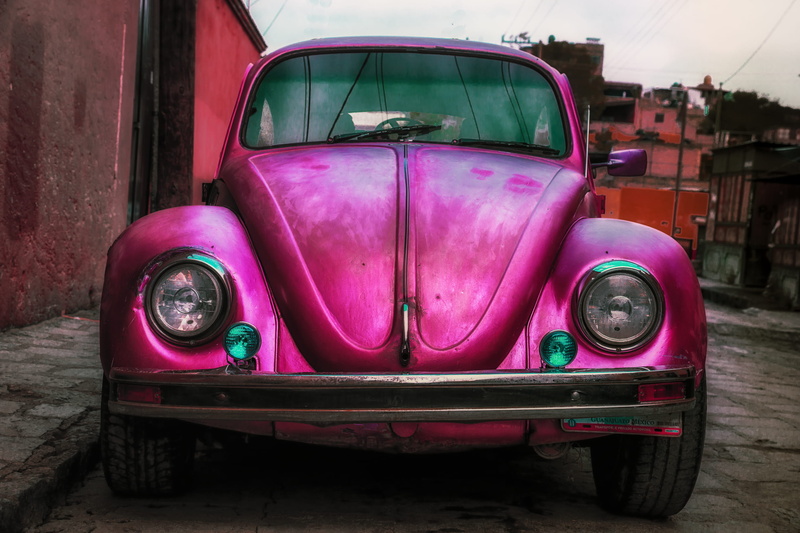 outdoors, lavender, building exterior, classic bug, architecture, transportation, no people, wheel, built structure, vintage car, 2K, land vehicle, vw bug