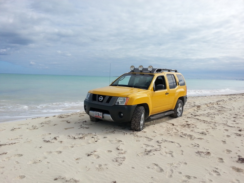 sand, sky, motor vehicle, nissan, offroad, 4x4, cancun, horizon over water, land, land Vehicle, 2K, cloud - sky, day, yellow, off-Road Vehicle, transportation