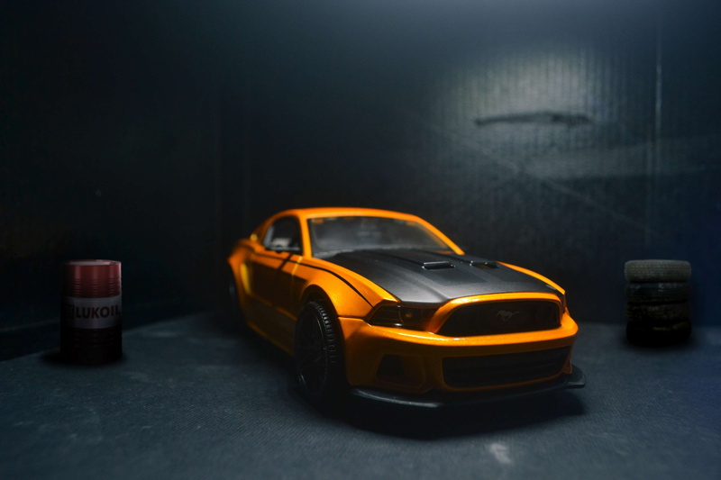 room, luxury cars, showroom, transportation, wet, toy car, toy, yellow, vechicle, travel, yellow car, indian, orange color, still life, land vehicle, yellow taxi