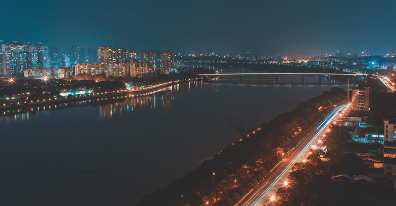 way, residential district, river, building exterior, sky, town, traffic jam, grey, metropolis, nature, architecture, no people, illuminated, water, waterfront