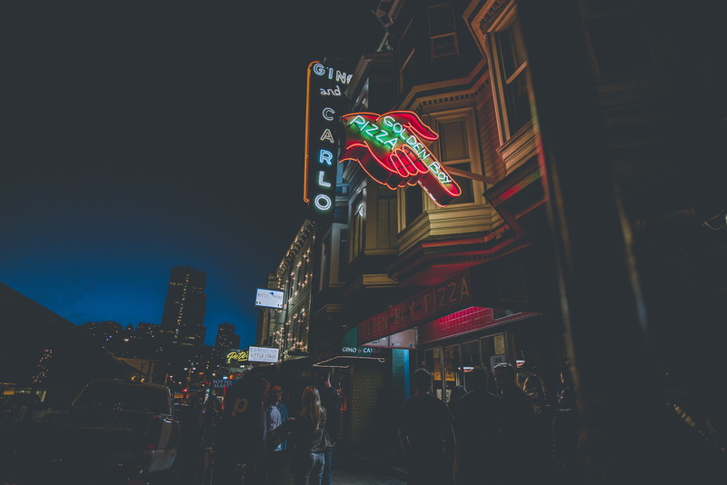 nature, illuminated, neon, skyscraper, incidental people, building, sign, time, city, tall - high, low angle view, built structure, outdoors, nigh, building exterior
