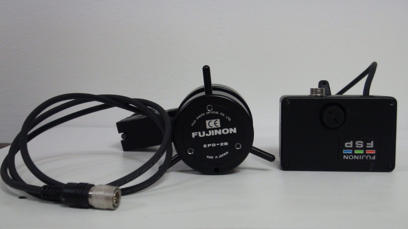 headphones, black color, Fujinon, cable, internet, arts culture and entertainment, studio shot, listening, text, power supply, communication, indoors, table