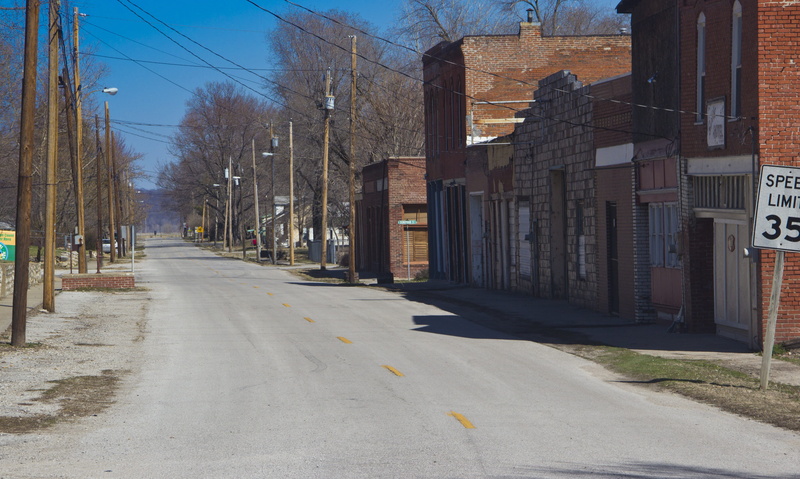 main street, town, day, built structure, architecture, transportation, nature, sky, sign, direction, empty, small town, building exterior, long, city, the way forward